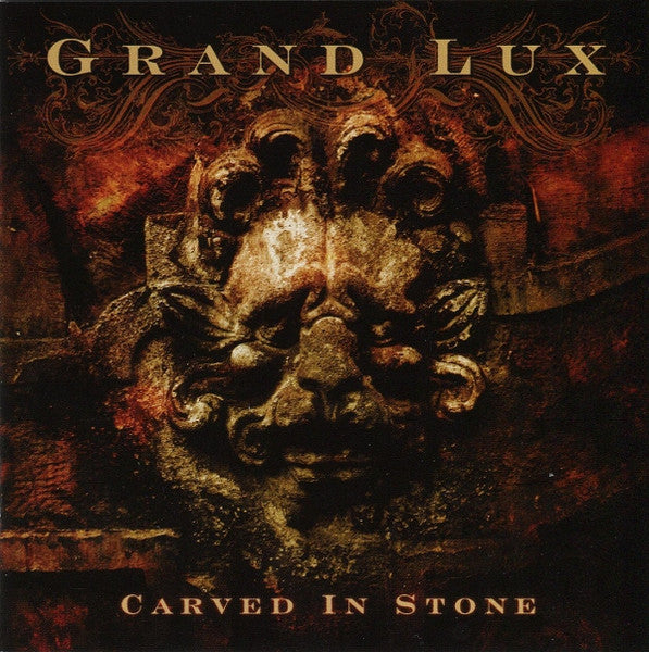 GRAND LUX  - CARVED IN STONE